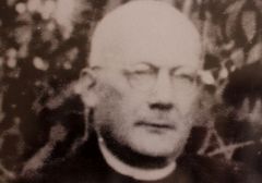 ks. Joachim Ziemetzki Reprodukcja zdjęcia z wystawy o warmińskich męczennikach – Krzysztof Kozłowski
